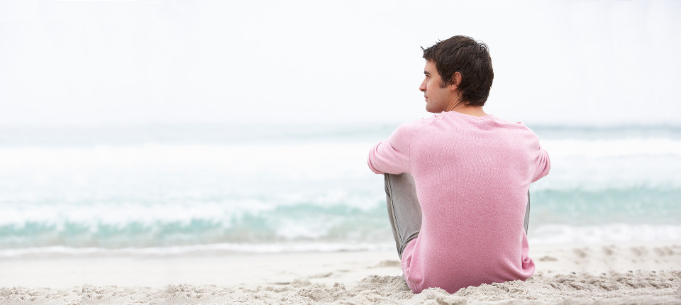 Man sitting on the beach meditation