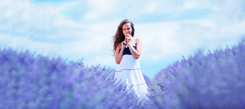 Woman standing on a lavender field meditation